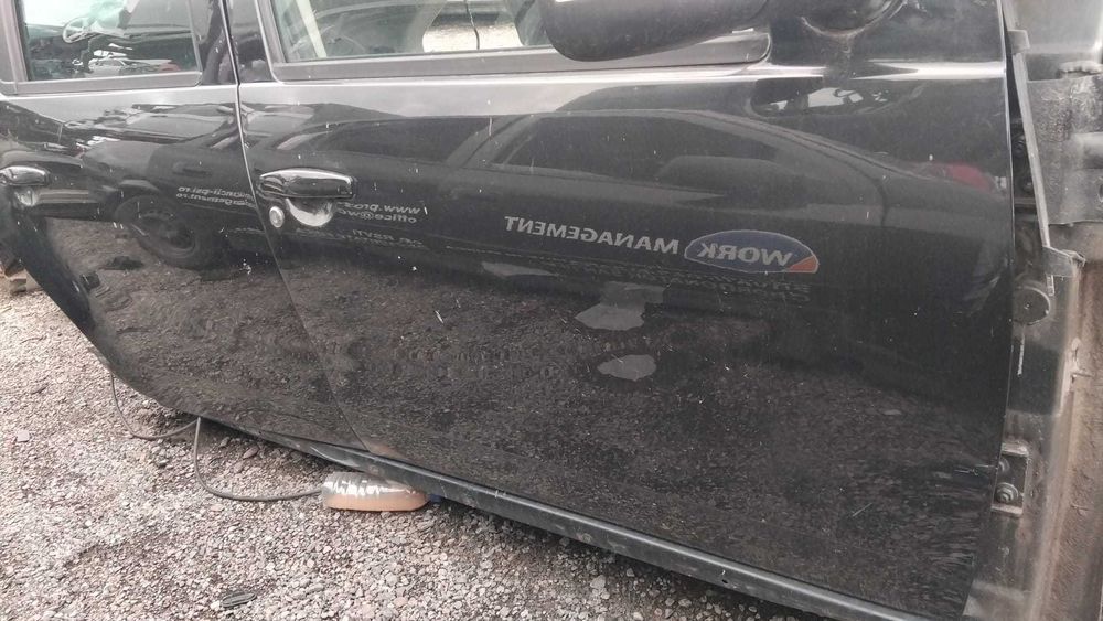 Usa dreapta fata/spate Dacia Duster an 2010