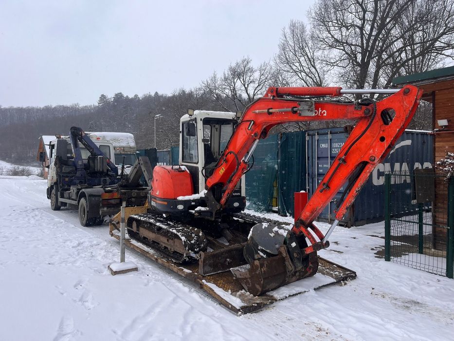 Transport macara cu platforma si container moloz