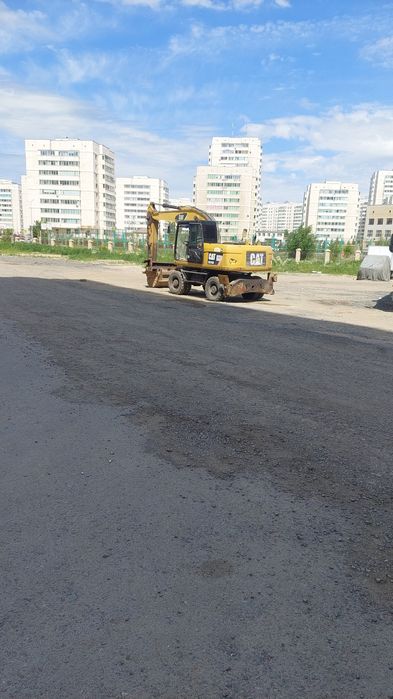 Услуги колесного эксковатора