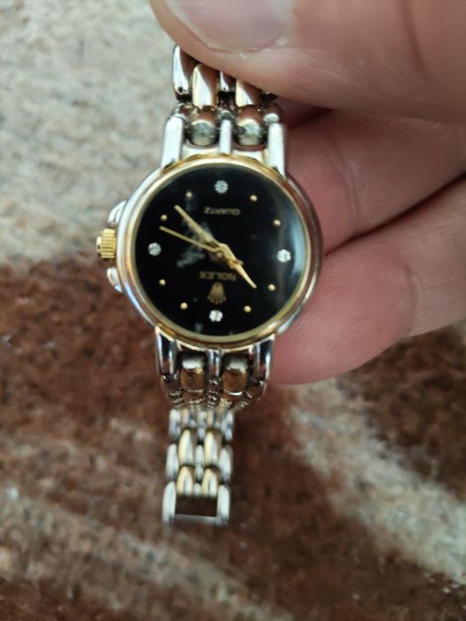 2бр дамски часовници ролекс и белучи