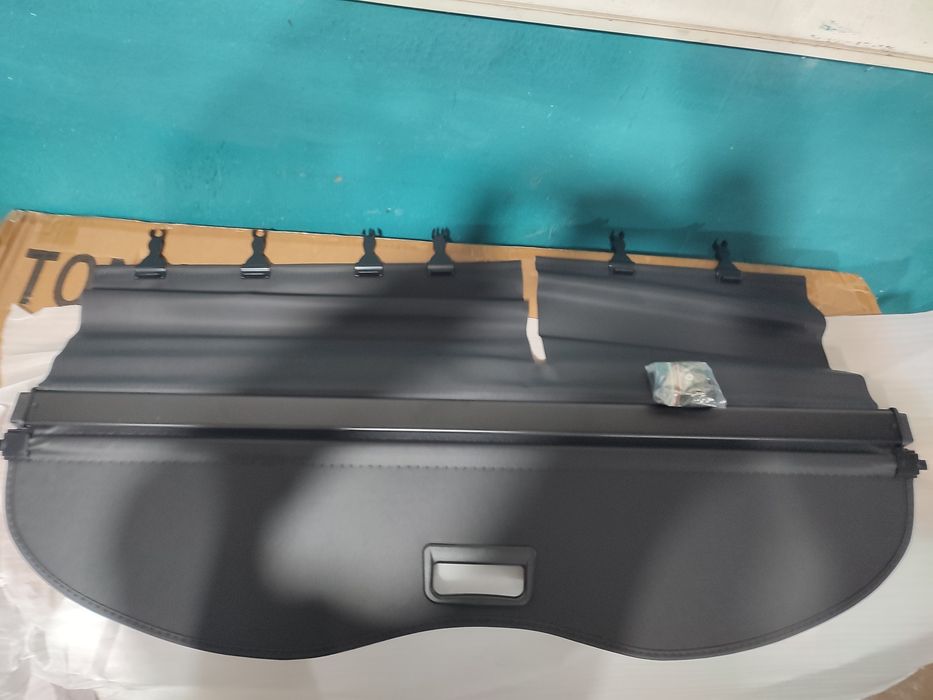 Продам шторку багажника на nissan