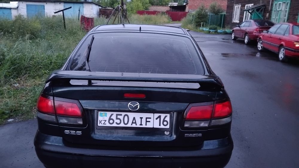 Мазда 626 птичка