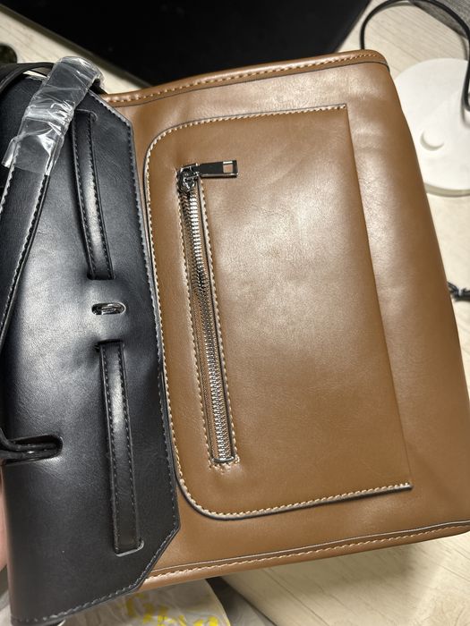 Совсем новая сумка.