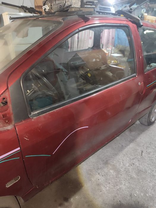 Двери на Рено твинго