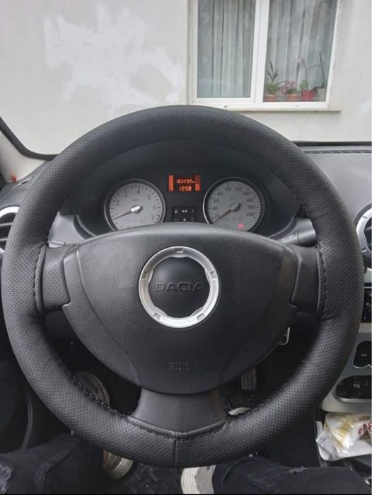 Imbrac volane prin cusatură pentru orice autovehicul