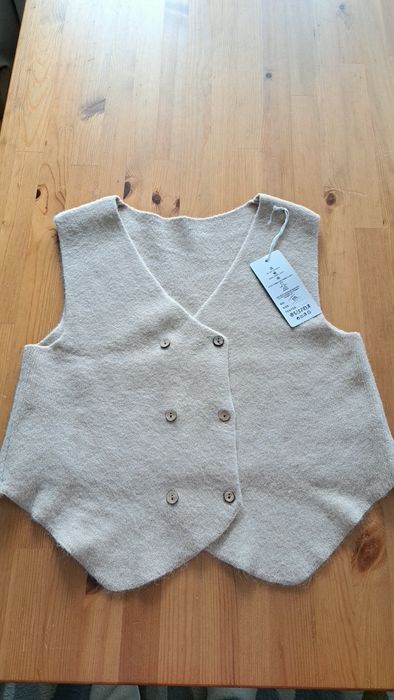 Vesta bej, noua cu eticheta