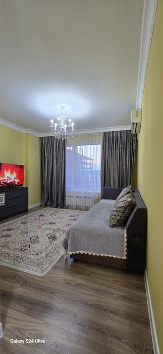 По часам апартаменты в Талане