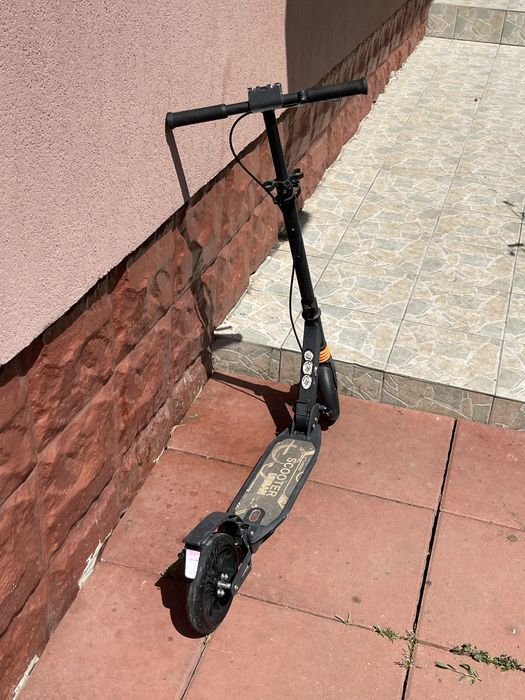 Trotineta cu frana pe disc