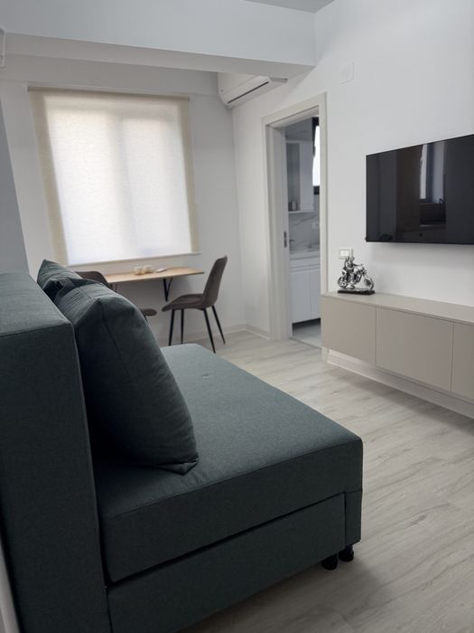 Proprietar inchiriez apartament 2 camere loc de parcare central Otopeni
