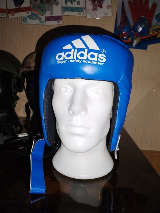 Шлем защитный для спортивных единоборств. Новые