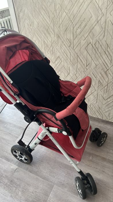 Продам коляску розовую