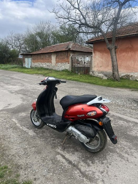 Скутр CYMKO Yup50