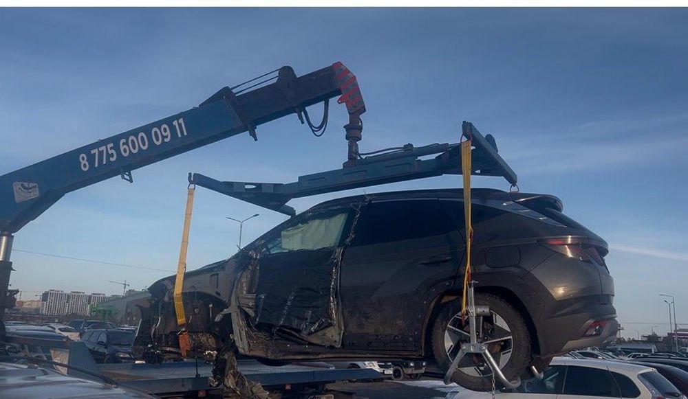 Эвакуатор с краном