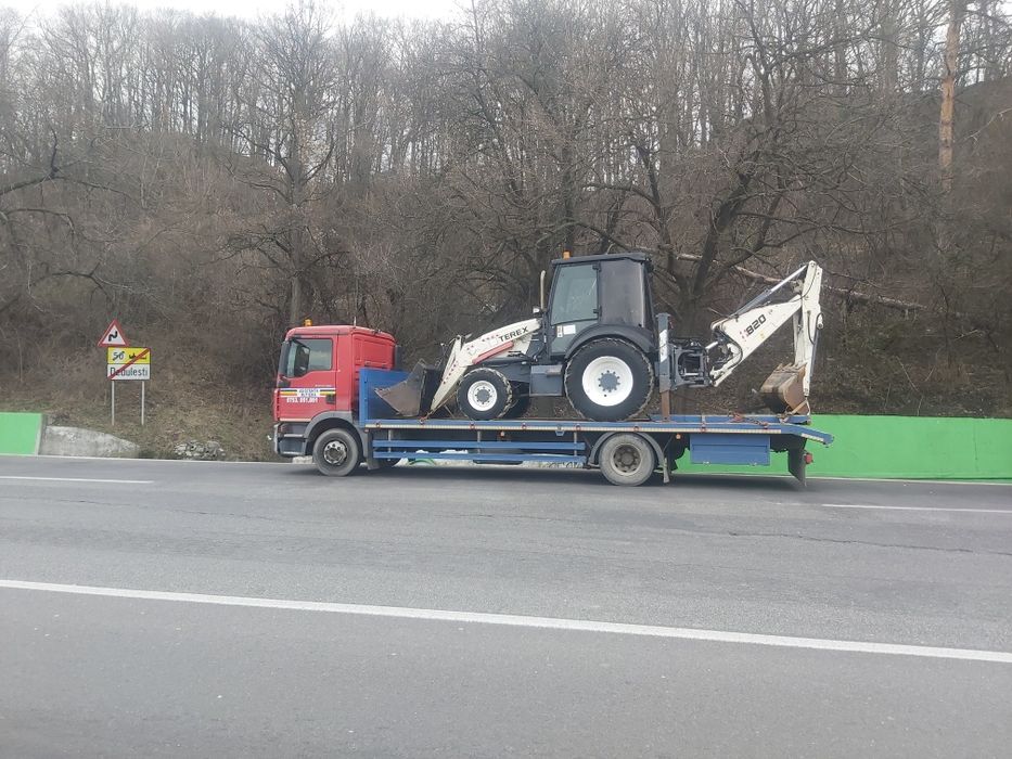 Transport buldo excavatoare,utilaje,tractoare,inchiriez platforma trailer