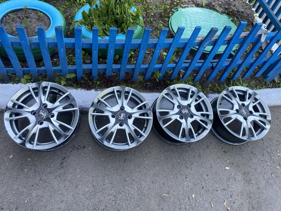Продам комплект титановых дисков R14