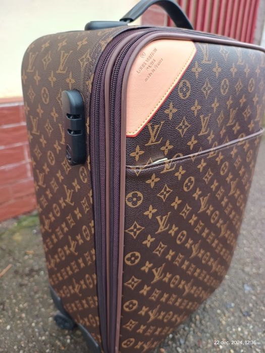 Vând Troller Luis Vuitton Nou*