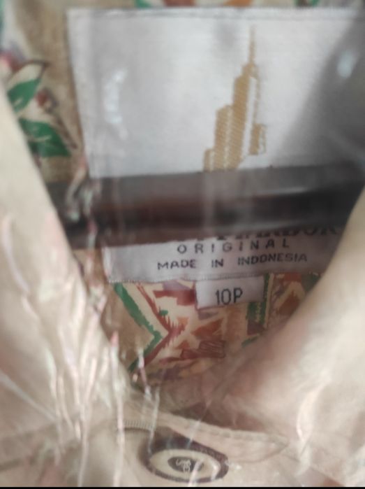 Женский плащ в хорошем состоянии