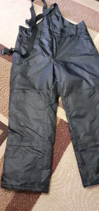 Тёплые штаны на 60 размер новые..