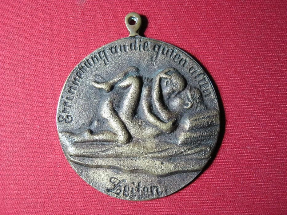 Medalie,medalion,sexualitate explicita,Germania.