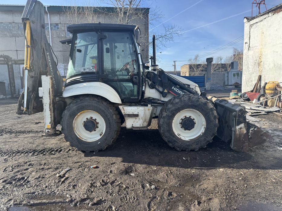 Экскаватор-пргрузчик продам