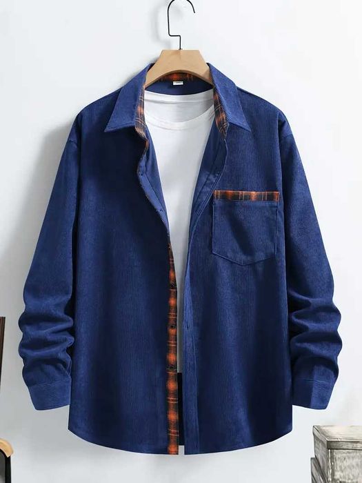 Мужская рубашка большого размера на пуговицах.