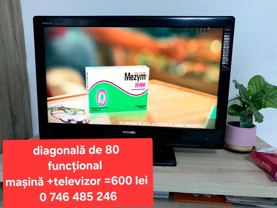 Mașină de spălat și televizor.
