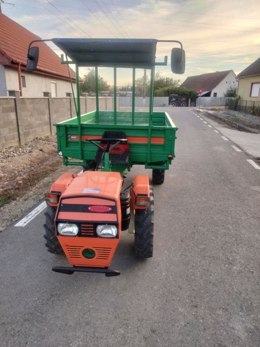 Vand motoagricola 18 ca și tractor 445 plus utilaje aferente pentru tractor freza de 170 plug cu doua câmpuri tocătoare de resturi vegetale și remorca