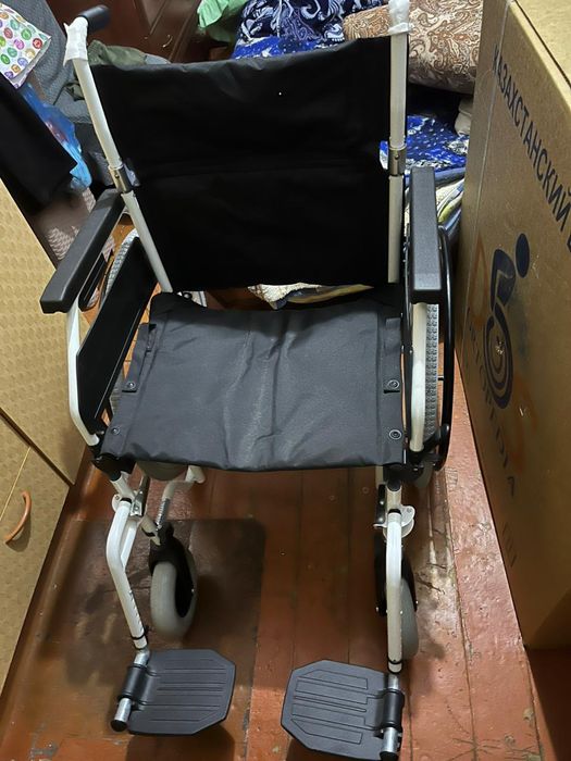 Инвалидная коляска новая