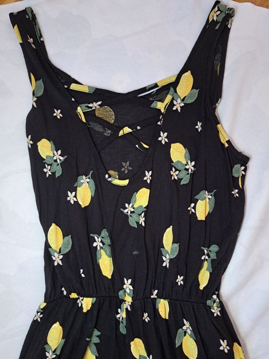 Черен платнен гащеризон на лимони