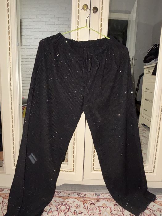 Продам брюки клёш с блестками