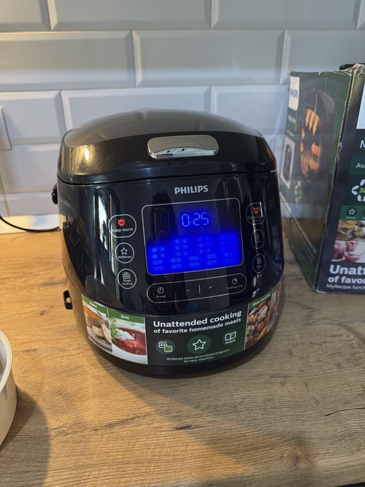 Multicooker Philips HD4749/70, 1070 W, 5 L, functie Slow-Cooker, 22 Programe automate, Negru