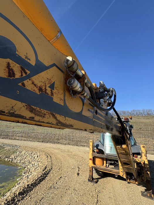 Buldoexcavator Case 580 Ranger impecabil  5700 ore de functionare