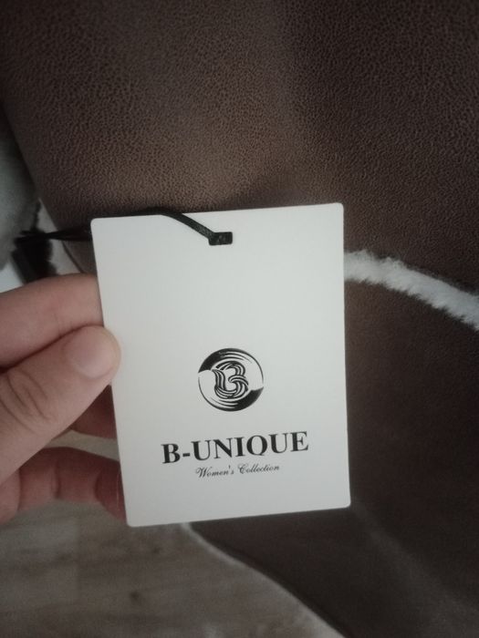 Длинная женская дубленка