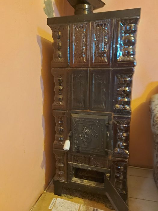 Soba de caldura teracota și incalzitoare pe motorina