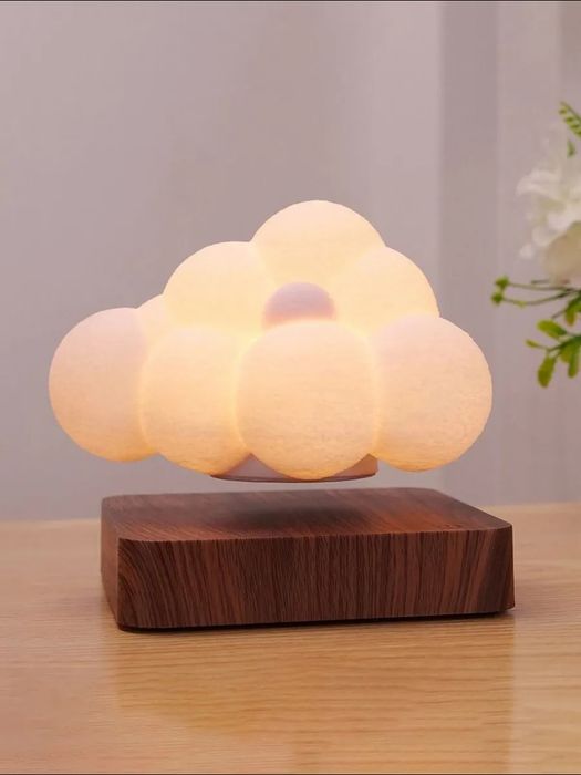 Левитирующая парящий и вращающийся облачко с подсветкой