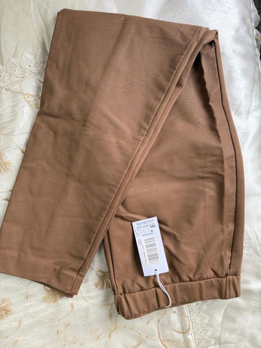 Брюки пройзводство Италия