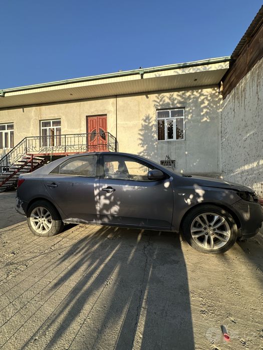 Kia forte 2009 xolati ortacha remont qivorish kerak