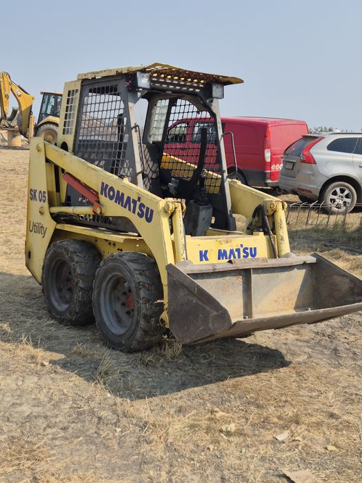Vând bobcat komatsu sk 05