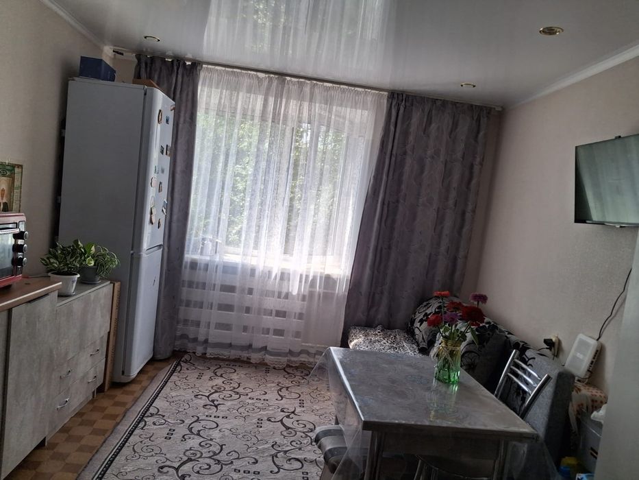 Продам 1 комнату в общежитии,  район  ДБС, Шухова 42