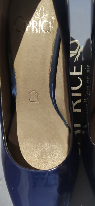 Нови обувки Caprice