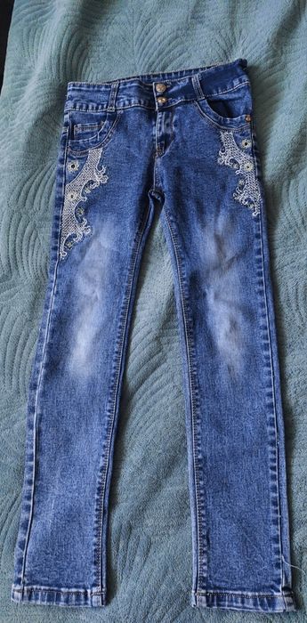 Джинсы для девочки 8-9 лет