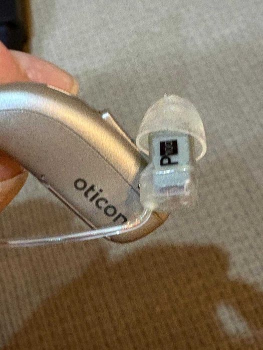 Aparat Auditiv Oticon Real 2 (Partea Stângă) – Tehnologie Premium, Reîncărcabil