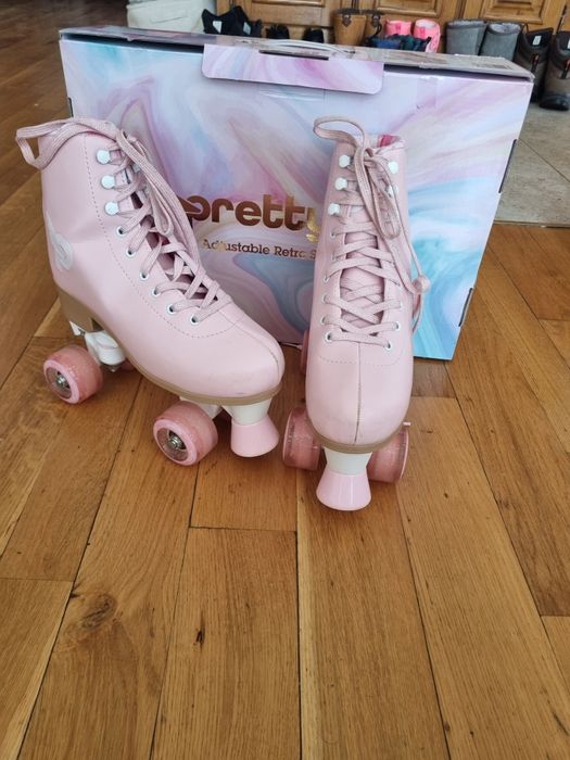 Patine cu rotile culoare roz,marime reglabila 35-38