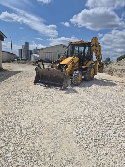 Услуги с комбиниран багер,бобкат  и  самосвали.