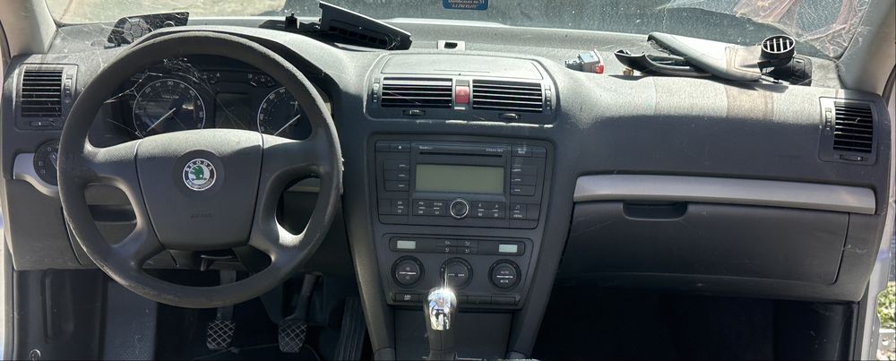 Plansa bord Skoda Octavia 2 / torpedou grile clima volan centura