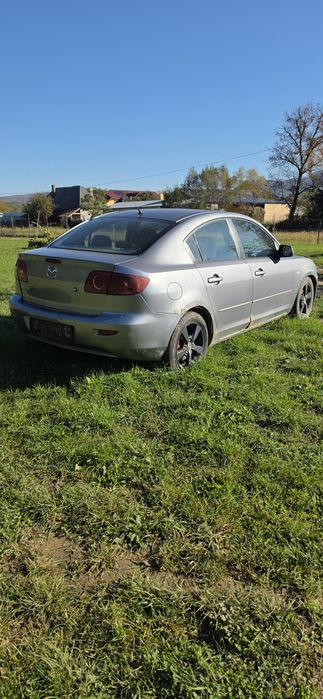 Mazda 3 An 2004.