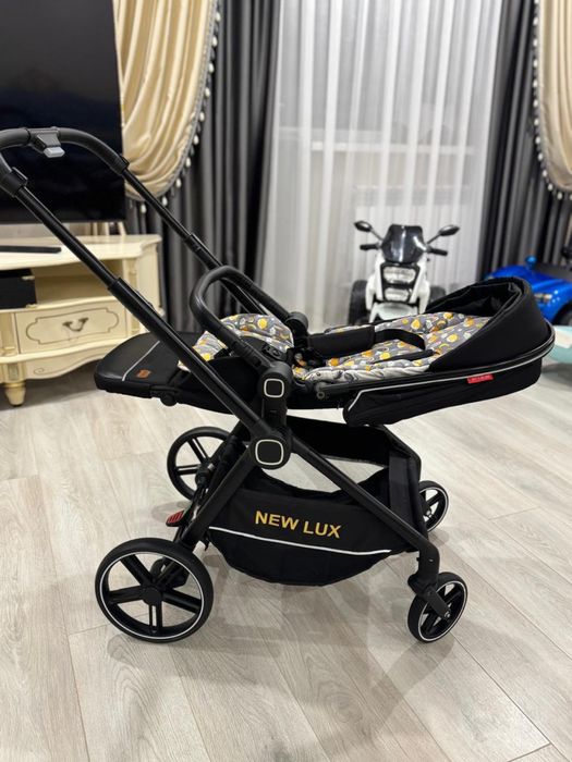 Комфортная коляска  NEW LUX
