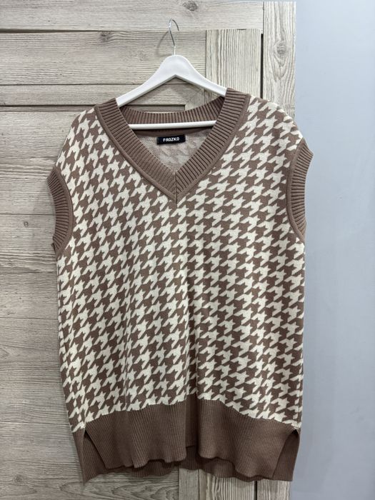 Модная жилетка