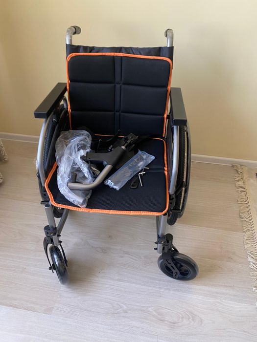 Инвалидная коляска