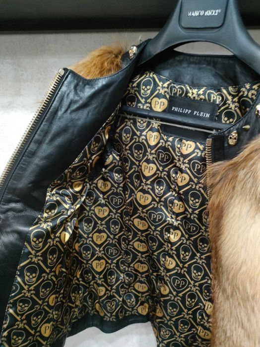 Продам кожаную жилетку